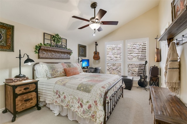 107 Lachite Unit 6, Horseshoe Bay, TX 78657 - bedroom featuring light carpet, lofted ceiling, and a ceiling fan