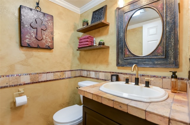 107 Lachite Unit 6, Horseshoe Bay, TX 78657 - half bathroom with ornamental molding, toilet, vanity, and tile walls