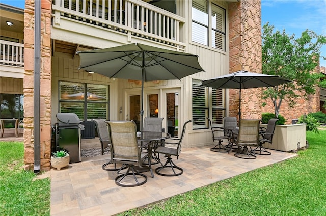 107 Lachite Unit 6, Horseshoe Bay, TX 78657 - view of patio / terrace featuring a balcony and outdoor dining space