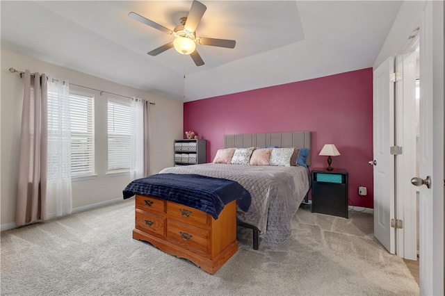 109 Red Cedar Ct, Georgetown, TX 78628 - bedroom featuring carpet flooring, baseboards, ceiling fan, and a tray ceiling