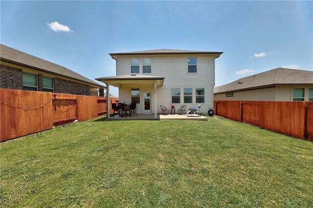 109 Red Cedar Ct, Georgetown, TX 78628 - rear view of property with a patio area