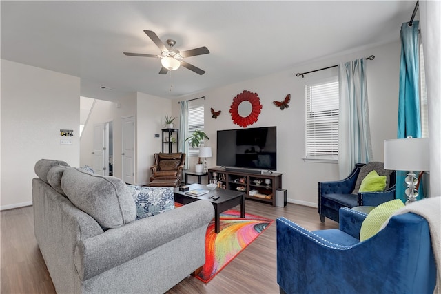 109 Red Cedar Ct, Georgetown, TX 78628 - living room featuring a ceiling fan, wood finished floors, and baseboards