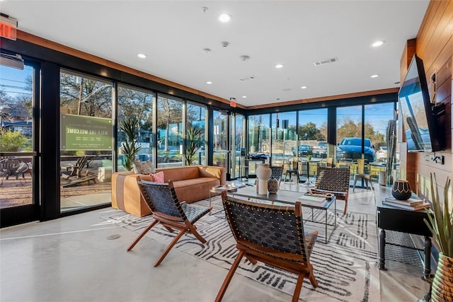 2505 Thornton Rd Unit 1312, Austin, TX 78704 - sunroom / solarium featuring finished concrete flooring, recessed lighting, and floor to ceiling windows