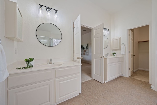 3619 Fossilwood Way, Round Rock, TX 78681 - full bath with two vanities and tile patterned floors