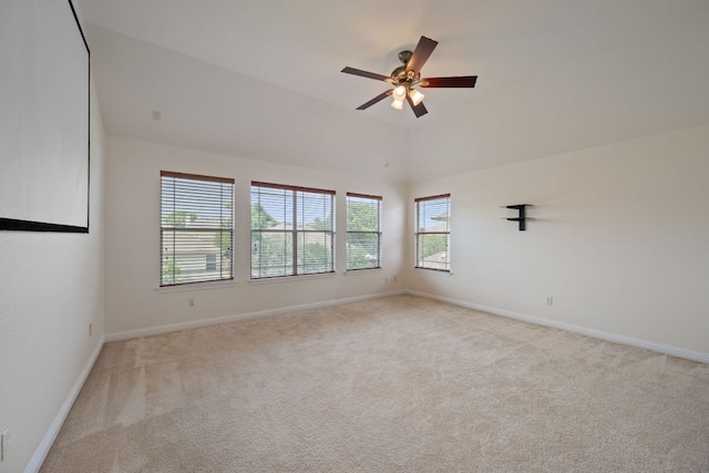 3619 Fossilwood Way, Round Rock, TX 78681 - spare room featuring light colored carpet, healthy amount of natural light, a ceiling fan, and vaulted ceiling