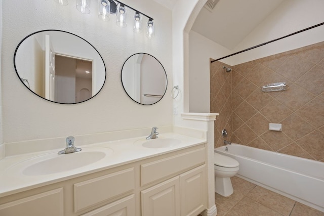 3619 Fossilwood Way, Round Rock, TX 78681 - full bathroom featuring double vanity, bathing tub / shower combination, vaulted ceiling, and tile patterned flooring