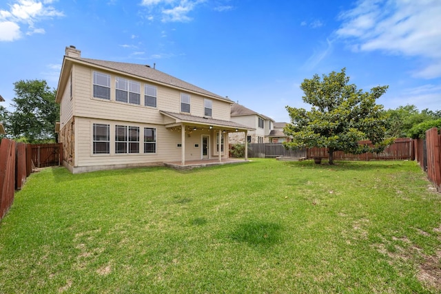 3619 Fossilwood Way, Round Rock, TX 78681 - back of house featuring a chimney, a patio, and a fenced backyard