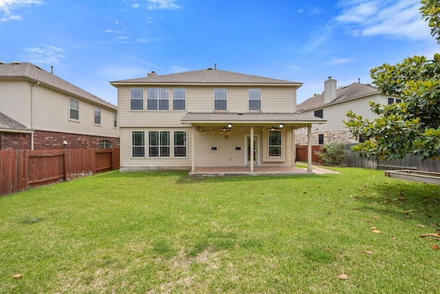 3619 Fossilwood Way, Round Rock, TX 78681 - rear view of property with a patio area and a fenced backyard