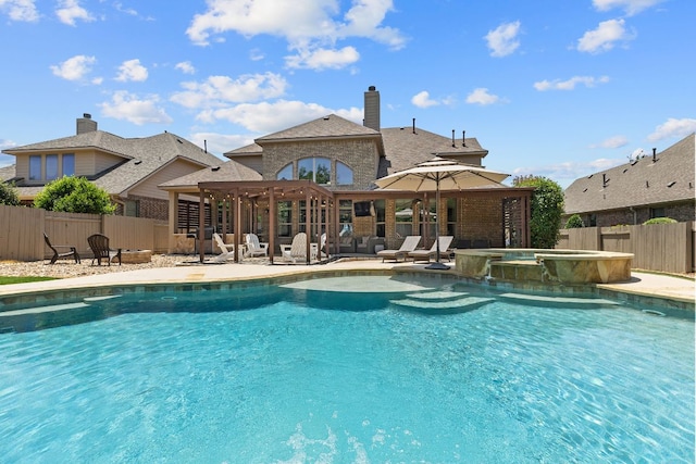 2516 Rusty Spur, Leander, TX 78641 - view of swimming pool with a fenced backyard, a patio, a pergola, and a pool with connected hot tub