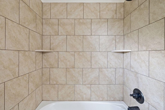 215 Maverick Cir, Horseshoe Bay, TX 78657 - bathroom featuring bathing tub / shower combination