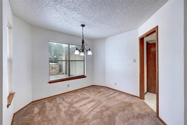 612 Tumlinson Fort Dr, Leander, TX 78641 - carpeted spare room with a chandelier, a textured ceiling, and baseboards