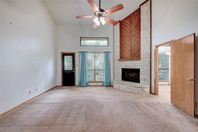 612 Tumlinson Fort Dr, Leander, TX 78641 - unfurnished living room with high vaulted ceiling, carpet flooring, a ceiling fan, and a fireplace