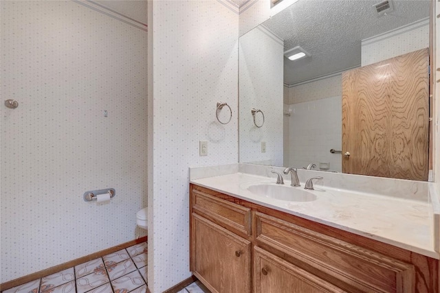612 Tumlinson Fort Dr, Leander, TX 78641 - bathroom featuring ornamental molding, toilet, wallpapered walls, a textured ceiling, and vanity