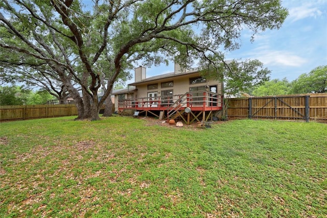 612 Tumlinson Fort Dr, Leander, TX 78641 - rear view of property featuring a wooden deck and a chimney