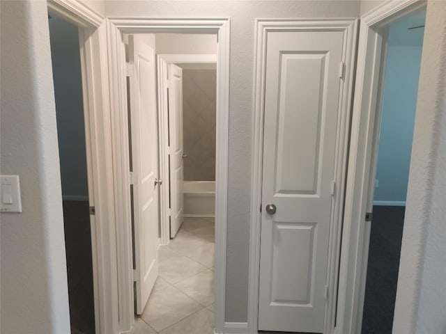 3332 Lauren Nicole Ln, Round Rock, TX 78665 - hallway with light tile patterned floors