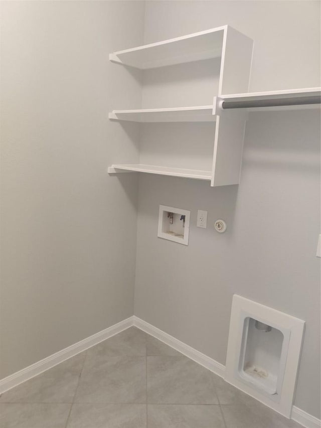 3332 Lauren Nicole Ln, Round Rock, TX 78665 - laundry area with washer hookup, gas dryer hookup, baseboards, and tile patterned floors