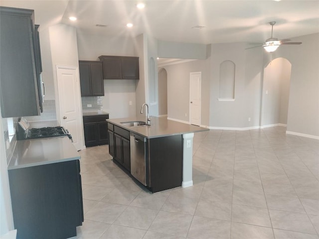 3332 Lauren Nicole Ln, Round Rock, TX 78665 - kitchen with arched walkways, stainless steel dishwasher, decorative backsplash, range, and open floor plan