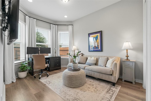 8112 Silhouette St, Austin, TX 78744 - office featuring light wood finished floors, baseboards, and recessed lighting