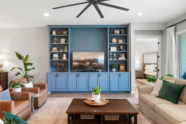 8112 Silhouette St, Austin, TX 78744 - living room featuring a ceiling fan, light wood-style floors, and recessed lighting