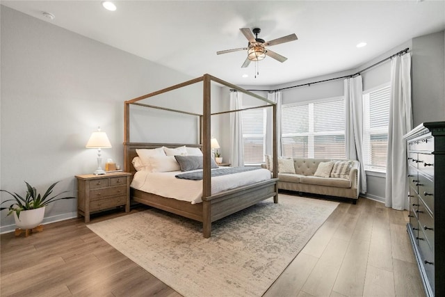8112 Silhouette St, Austin, TX 78744 - bedroom featuring light wood-style flooring, baseboards, recessed lighting, and a ceiling fan