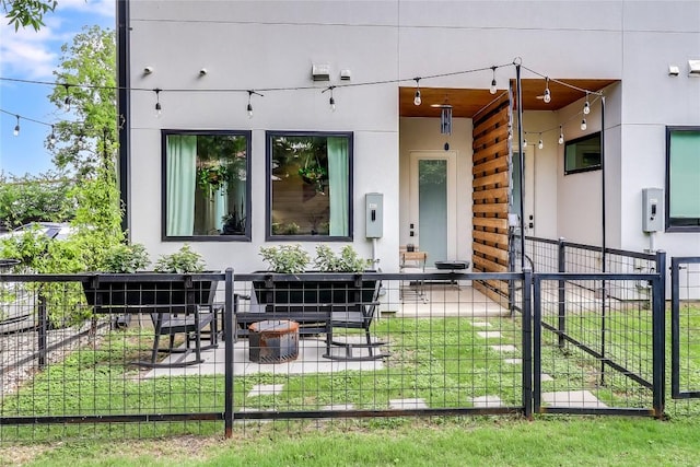 2108 Tillery St Unit 2105, Austin, TX 78723 - doorway to property with stucco siding and electric panel