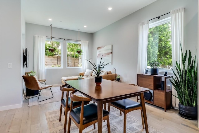 2108 Tillery St Unit 2105, Austin, TX 78723 - dining room with light wood-style flooring, recessed lighting, and baseboards
