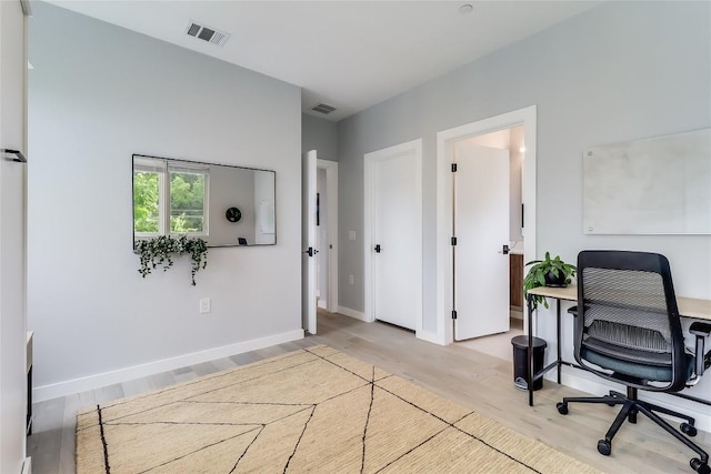 2108 Tillery St Unit 2105, Austin, TX 78723 - home office featuring wood finished floors and baseboards