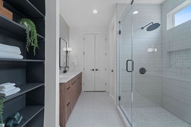 2114 Haskell St, Austin, TX 78702 - full bathroom with vanity, a shower stall, tile patterned floors, and recessed lighting