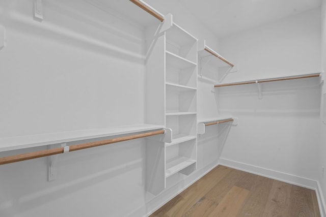 2114 Haskell St, Austin, TX 78702 - spacious closet with wood finished floors