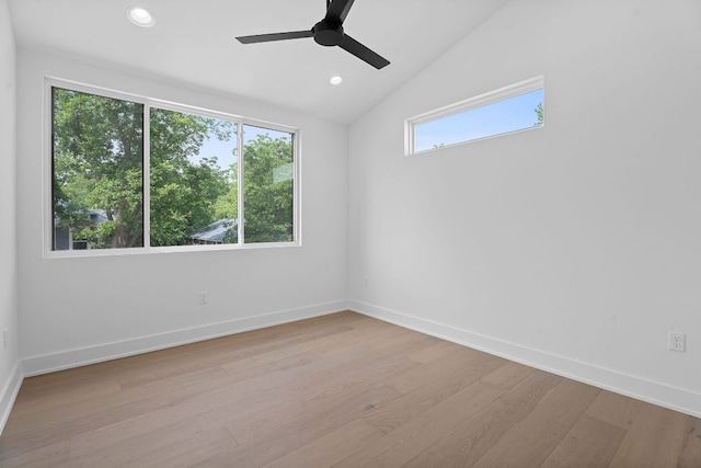 2114 Haskell St, Austin, TX 78702 - empty room featuring plenty of natural light, light wood-type flooring, recessed lighting, ceiling fan, and lofted ceiling