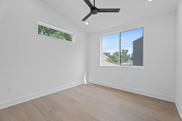 2114 Haskell St, Austin, TX 78702 - spare room featuring lofted ceiling, light wood finished floors, a ceiling fan, and recessed lighting