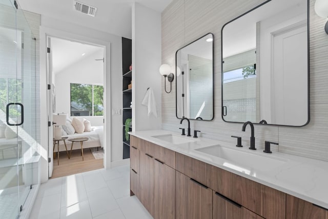 2114 Haskell St, Austin, TX 78702 - bathroom with ensuite bath, double vanity, and a stall shower
