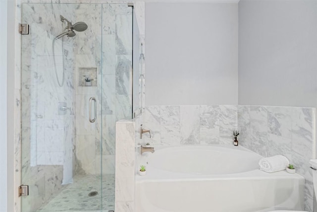 11203 Ranch Road 2222 1501, Austin, TX 78730 - full bathroom featuring a bath and a marble finish shower