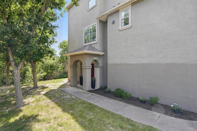 11203 Ranch Road 2222 1501, Austin, TX 78730 - entrance to property featuring stucco siding and a yard
