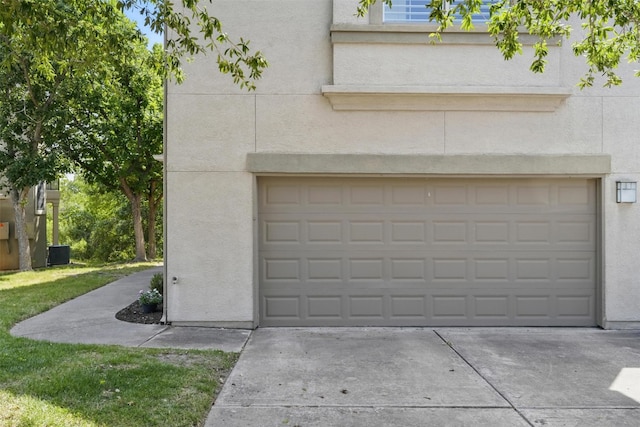 11203 Ranch Road 2222 1501, Austin, TX 78730 - garage featuring cooling unit and driveway
