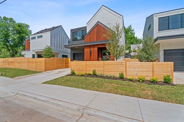 52 Robert T Martinez Jr St, Austin, TX 78702 - contemporary house with a fenced front yard