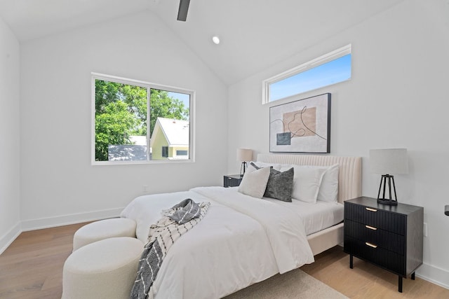 52 Robert T Martinez Jr St, Austin, TX 78702 - bedroom with multiple windows, wood finished floors, vaulted ceiling, ceiling fan, and recessed lighting