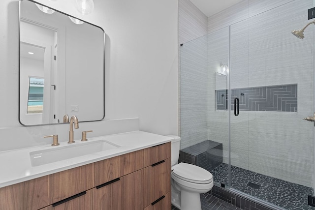 52 Robert T Martinez Jr St, Austin, TX 78702 - full bathroom with toilet, vanity, a shower stall, and tile patterned flooring