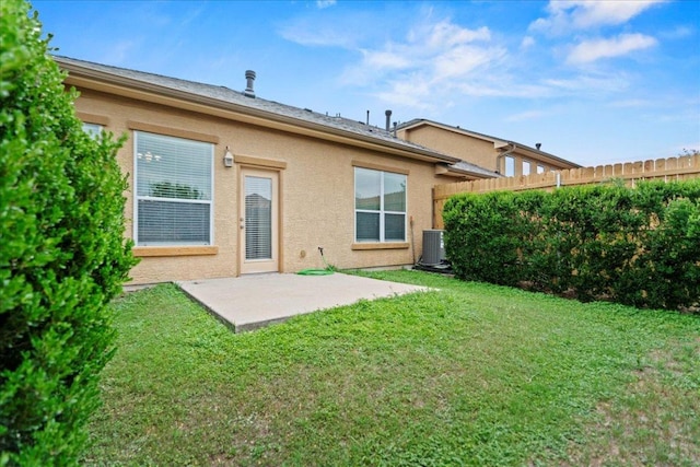 2210 Onion Creek Pkwy Unit 604, Austin, TX 78747 - back of property featuring a patio area, stucco siding, and central AC unit