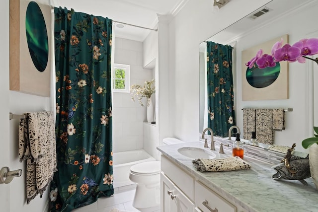 1711 Mohle Dr, Austin, TX 78703 - full bath with crown molding, toilet, vanity, tile patterned flooring, and shower / bath combo