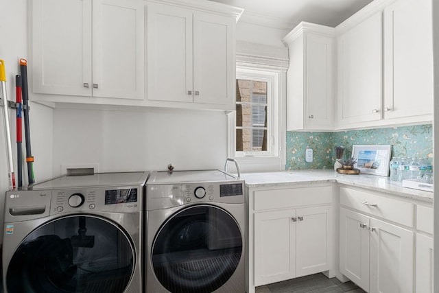 1711 Mohle Dr, Austin, TX 78703 - laundry room with washing machine and dryer and cabinet space