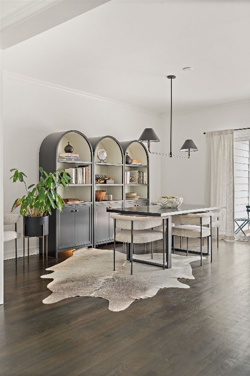 1711 Mohle Dr, Austin, TX 78703 - dining room featuring crown molding and wood finished floors