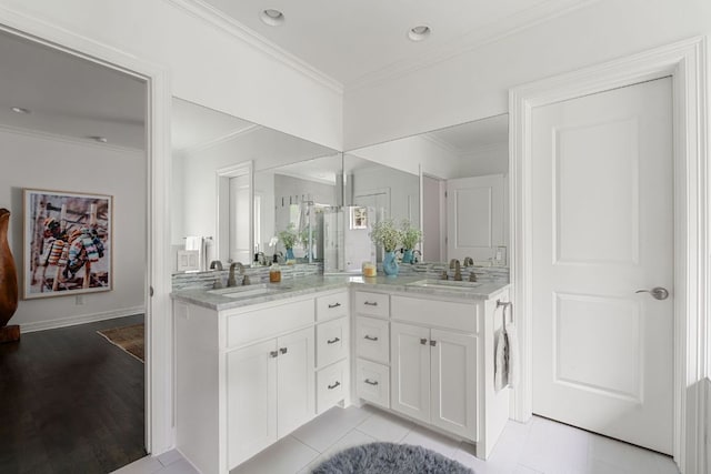 1711 Mohle Dr, Austin, TX 78703 - full bathroom with ornamental molding, vanity, and baseboards
