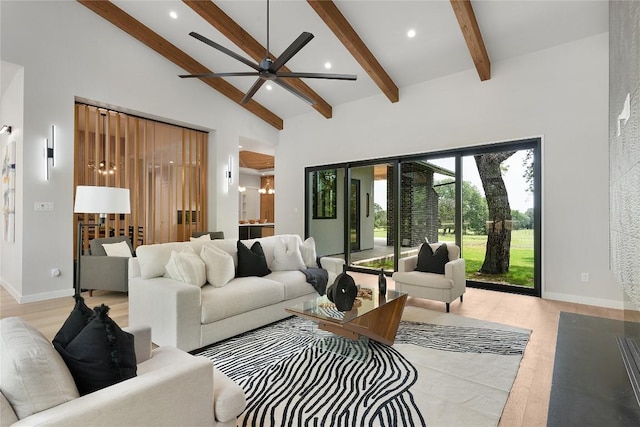 8341 Brewer Ln, Salado, TX 76571 - living area with beam ceiling, recessed lighting, a ceiling fan, baseboards, and high vaulted ceiling