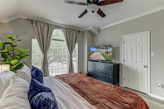 8002 Magic Mountain Cv, Round Rock, TX 78681 - bedroom with ornamental molding, light wood-type flooring, baseboards, and a ceiling fan