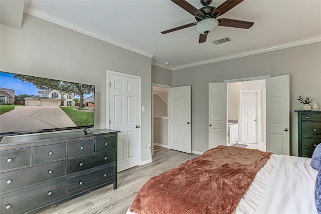 8002 Magic Mountain Cv, Round Rock, TX 78681 - bedroom with light wood finished floors, ornamental molding, baseboards, and a ceiling fan