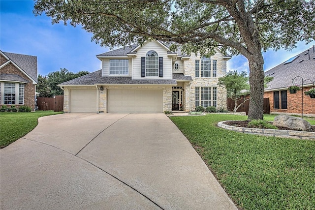 8002 Magic Mountain Cv, Round Rock, TX 78681 - traditional-style home with stone siding, driveway, an attached garage, and roof with shingles