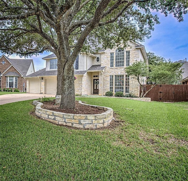 8002 Magic Mountain Cv, Round Rock, TX 78681 - traditional home featuring stone siding and concrete driveway