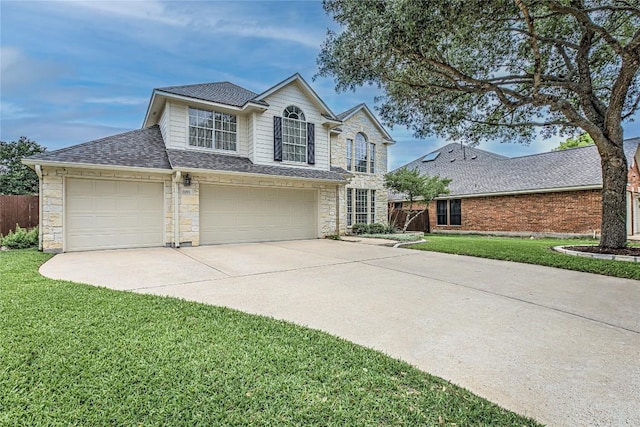 8002 Magic Mountain Cv, Round Rock, TX 78681 - traditional-style house with stone siding, driveway, a garage, and roof with shingles