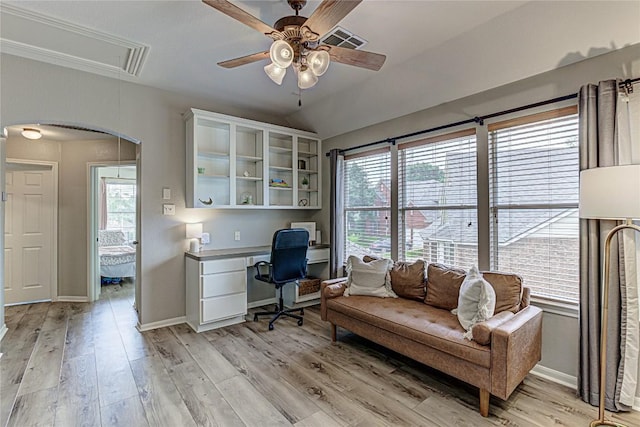 8002 Magic Mountain Cv, Round Rock, TX 78681 - office space featuring a ceiling fan, arched walkways, attic access, and light wood-style floors